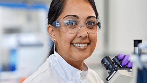 Researcher examining clinical study results
